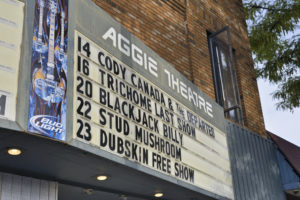 Fort Collins, Colorado, USA - August 8, 2013: Low angle view of upcoming acts at Aggie Theatre, one of the venues in town. Situated at the foot of the Rocky Mountains, Fort Collins is a college town with a thriving downtown and has been voted by Money magazine to be one of the best towns to live in.