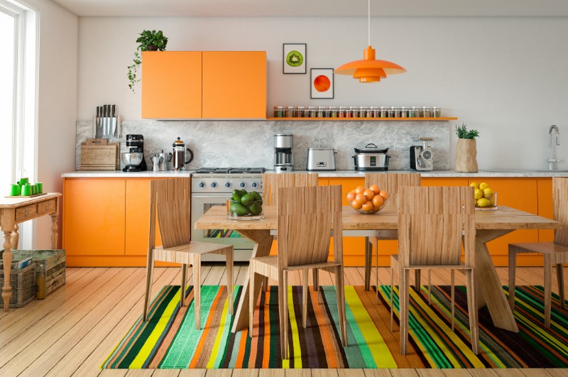 Kitchen full of orange colors | The Noel & Martinez Team